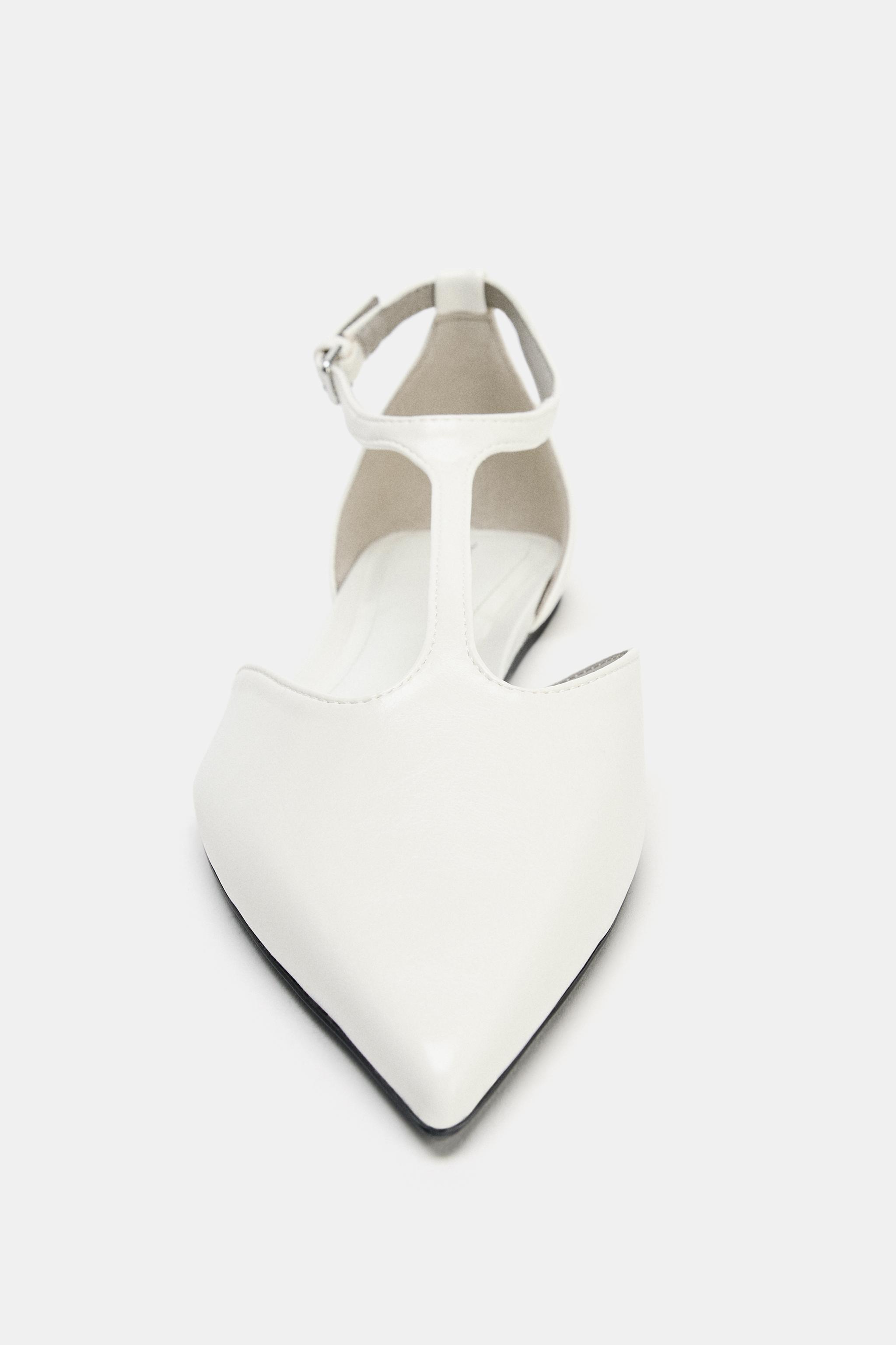 CHAUSSURES PLATES À BRIDE